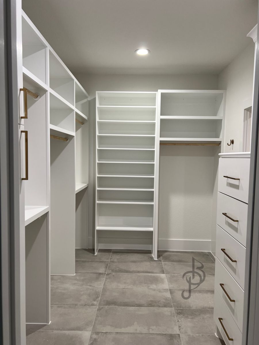 Bespoke custom wardrobe closet built and styled with drawers and shelves