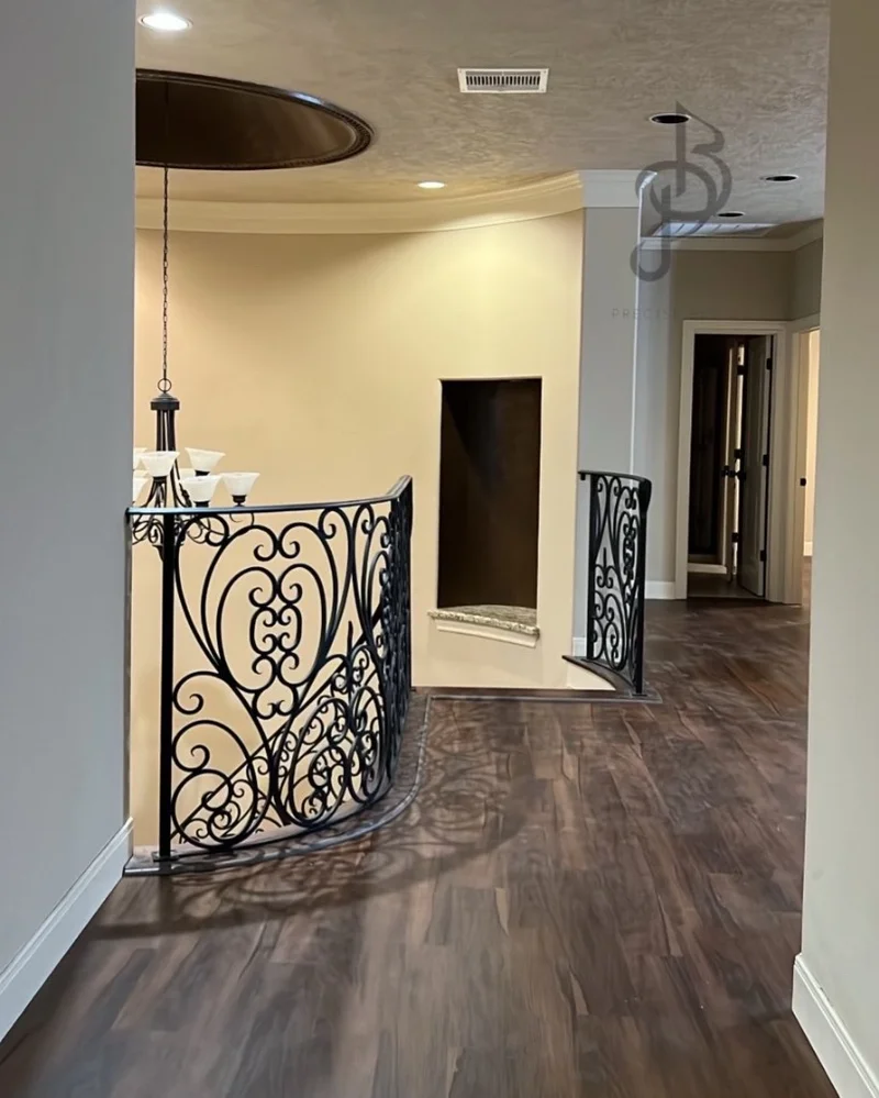 Wrought iron staircase railings custom scroll details